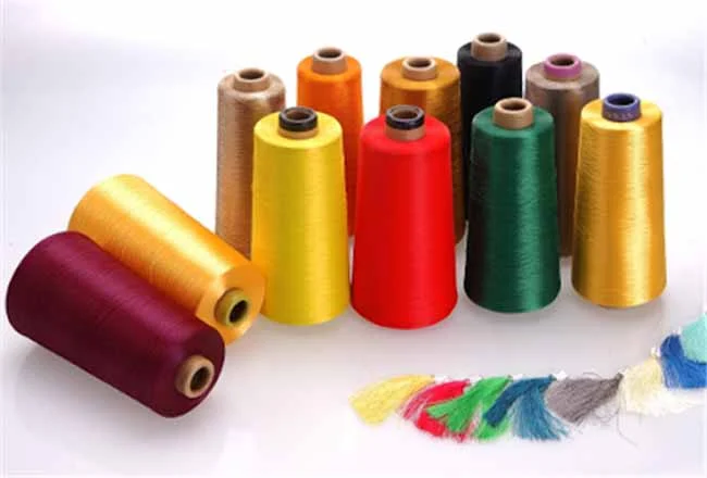 Cones of antibacterial knitting yarn with colour swatches