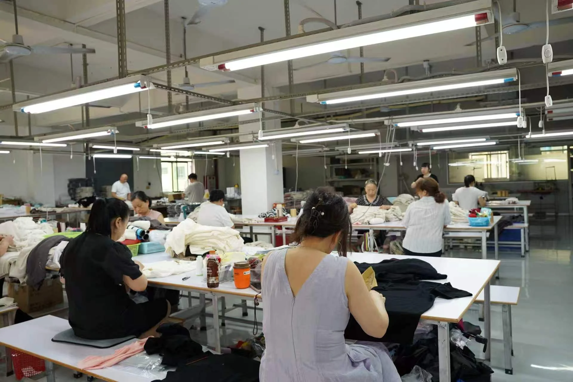 lpknit sewing and finishing team assembling knit garments