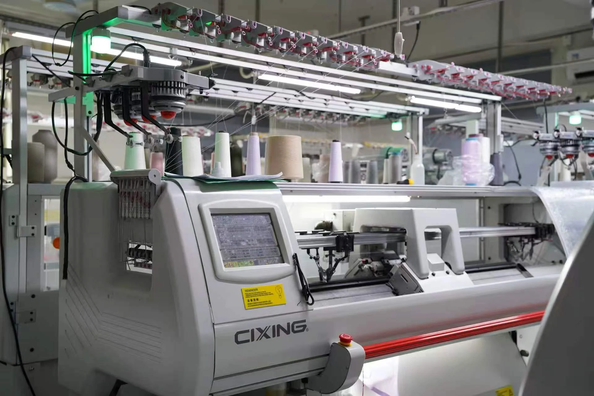 Hand-finishing and linking of knit sweaters at lpknit